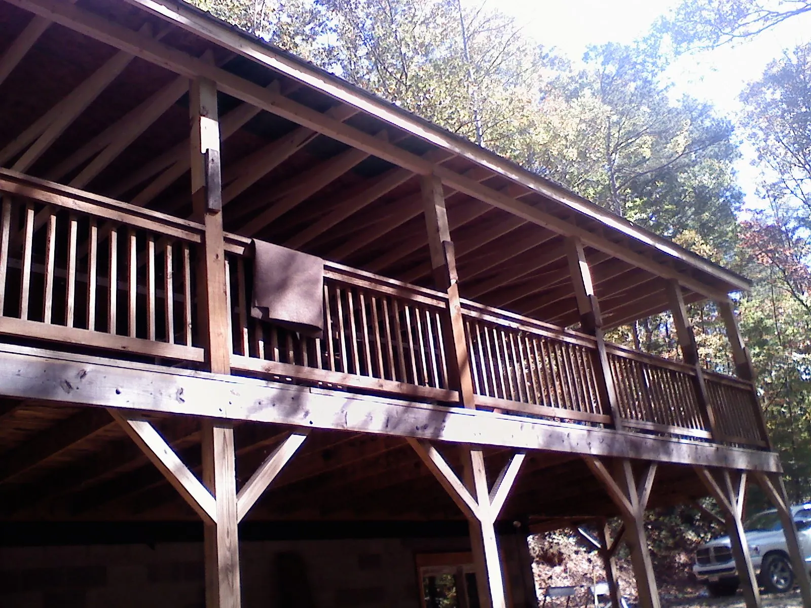 Timber framing under a new elevated porch and deck — Roof Leak Repair in Floral City by Roofing Brothers
